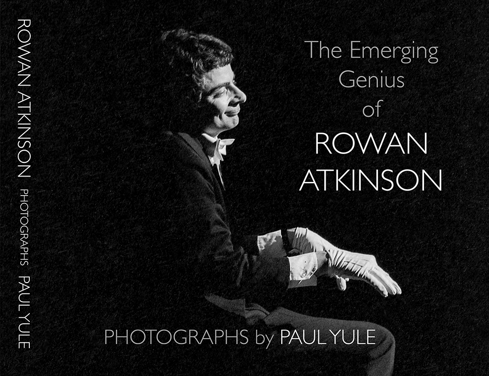 Rowan Atkinson playing the piano